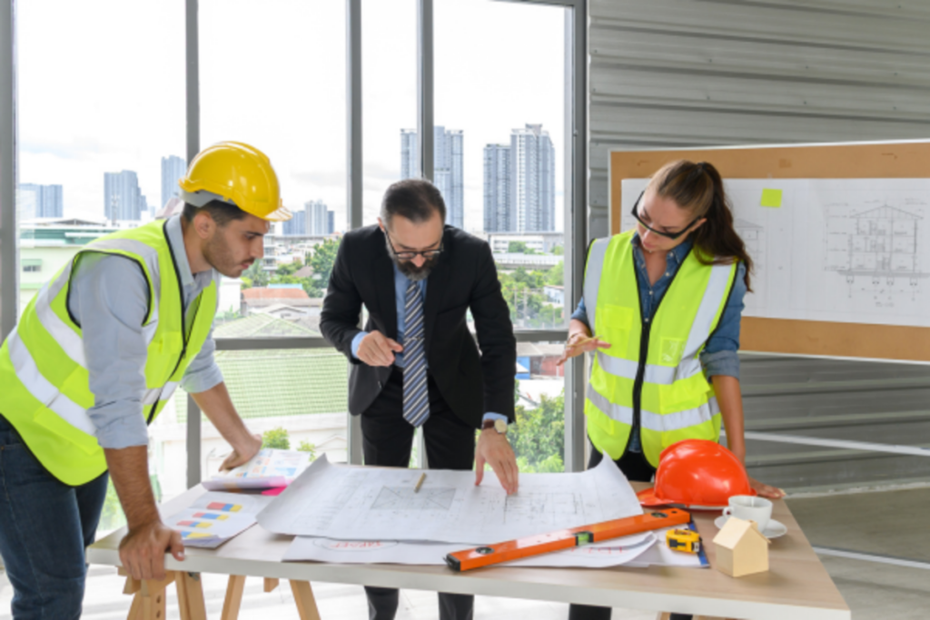 A team reviewing the construction site layout.