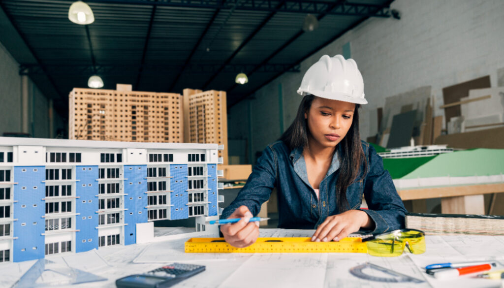 A lady studying the construction layout