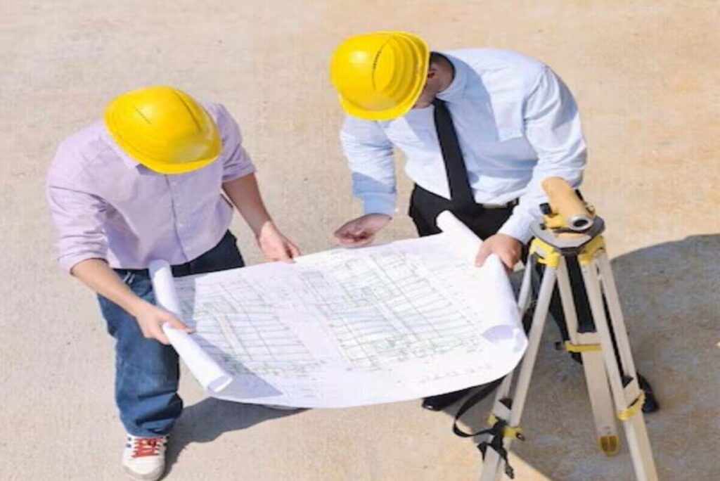 Contractors checking the construction site layout to ensure an effective building project