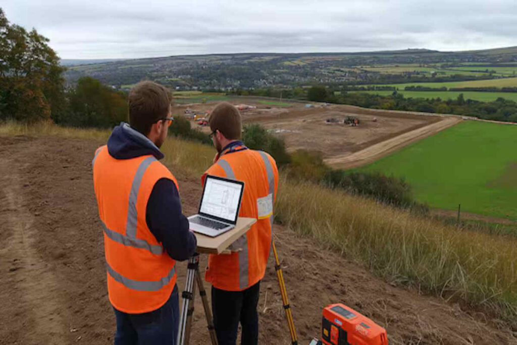 Land surveyors are gathering accurate data for a large-scale construction project